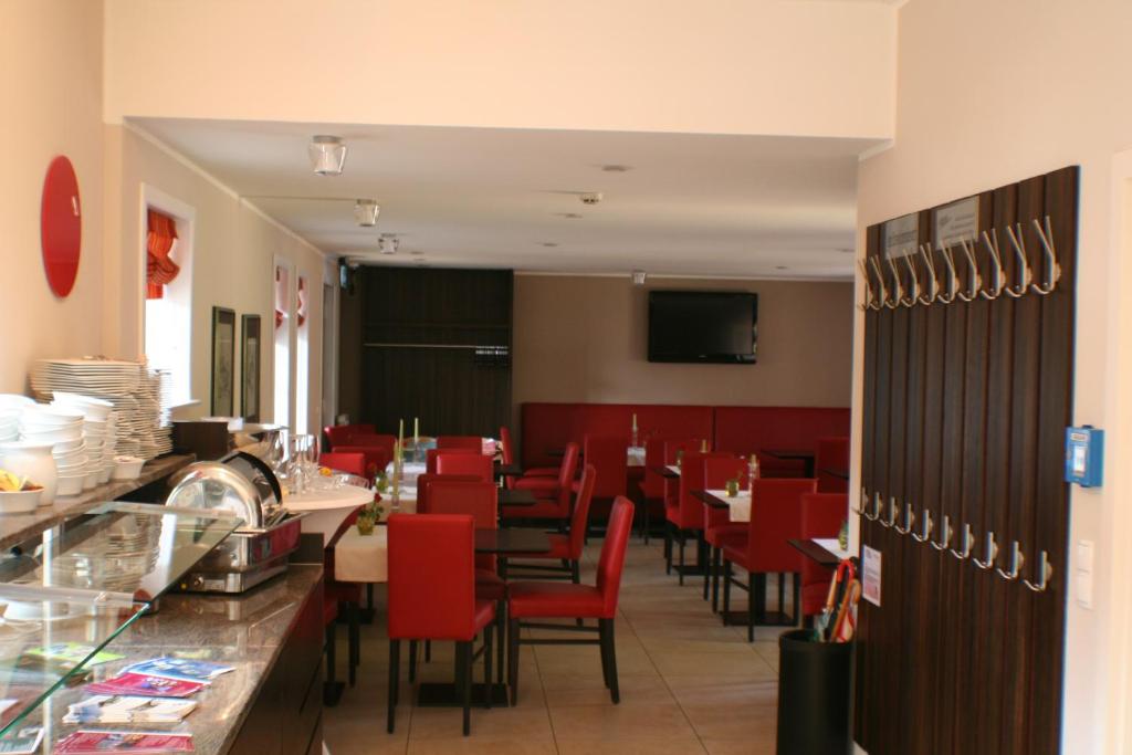 TV a/nebo společenská místnost v ubytování Hotel Am Kloster