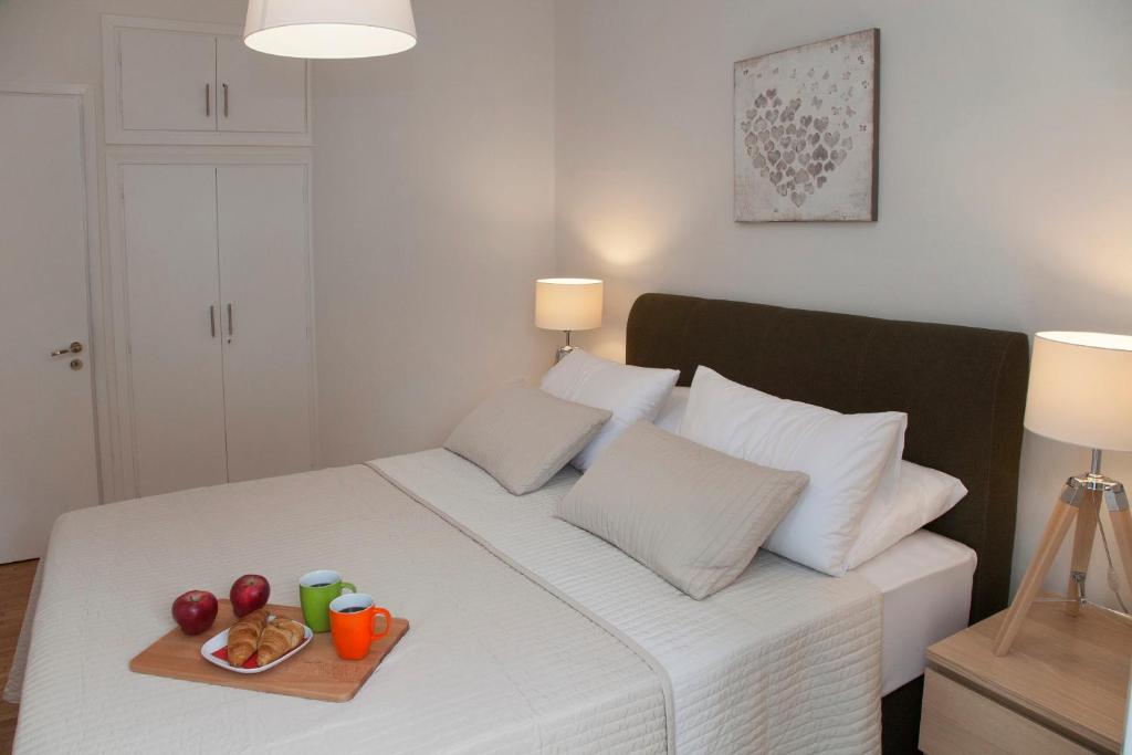 Posteľ alebo postele v izbe v ubytovaní Exceptional Penthouse close to Acropolis Museum by GHH