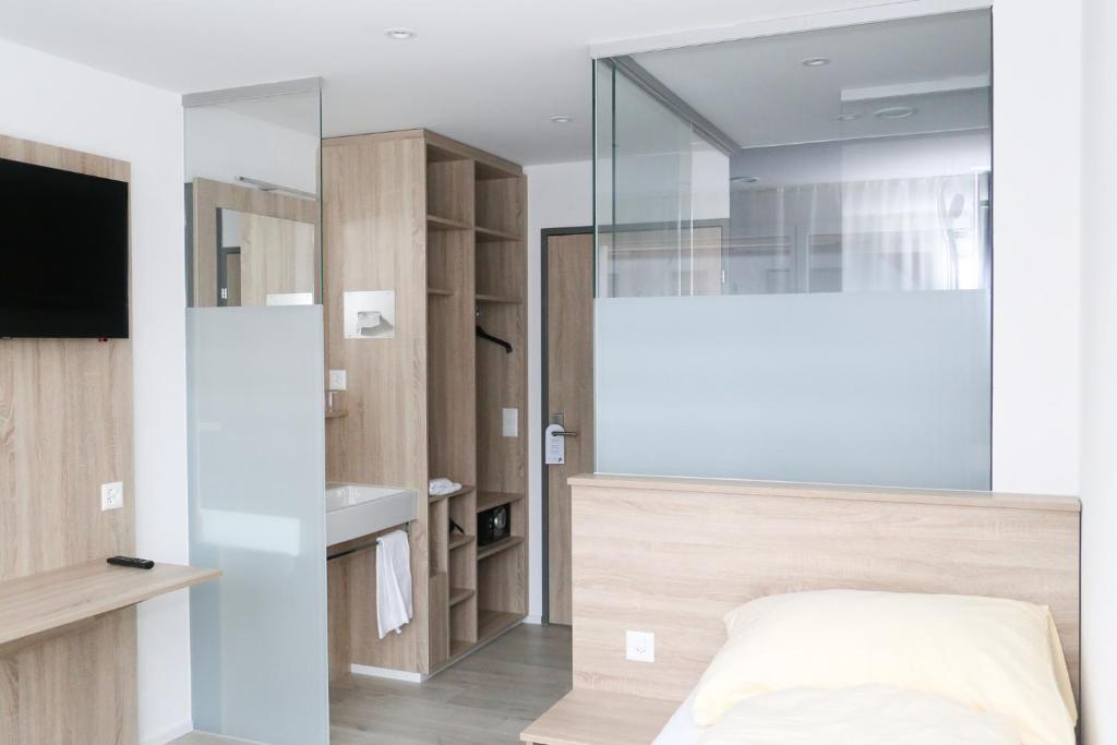 Koupelna v ubytování Hotel Traube Garni