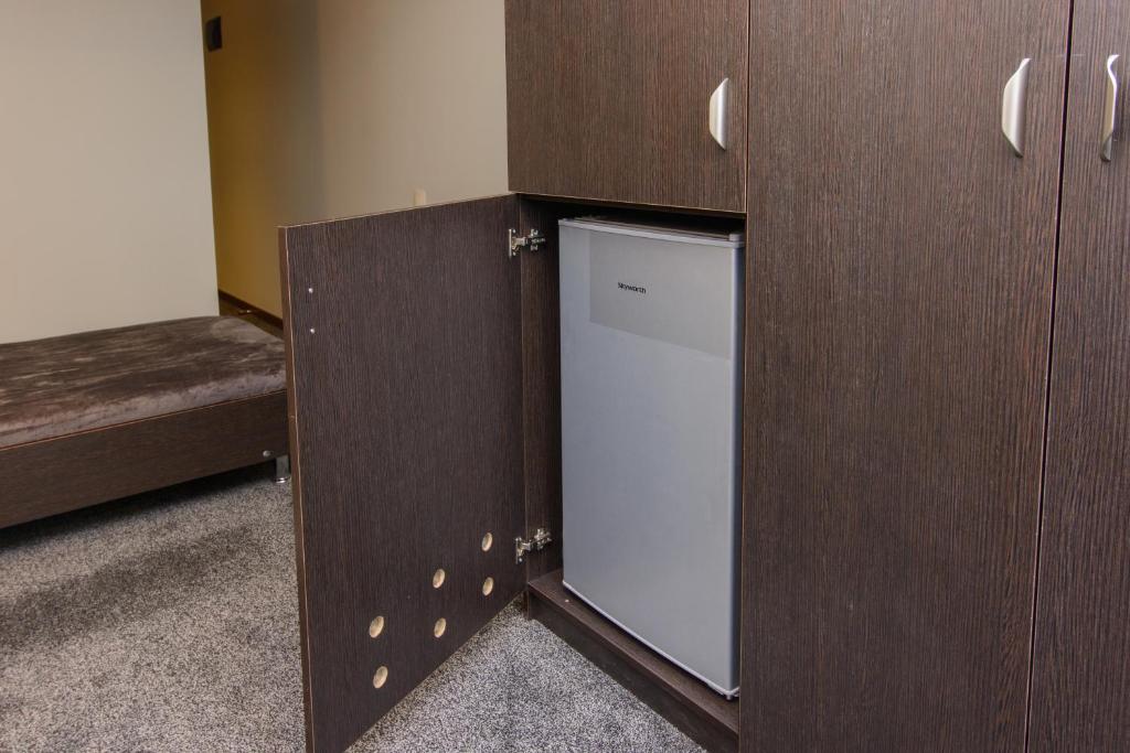 Postel nebo postele na pokoji v ubytování Hotel Reverence