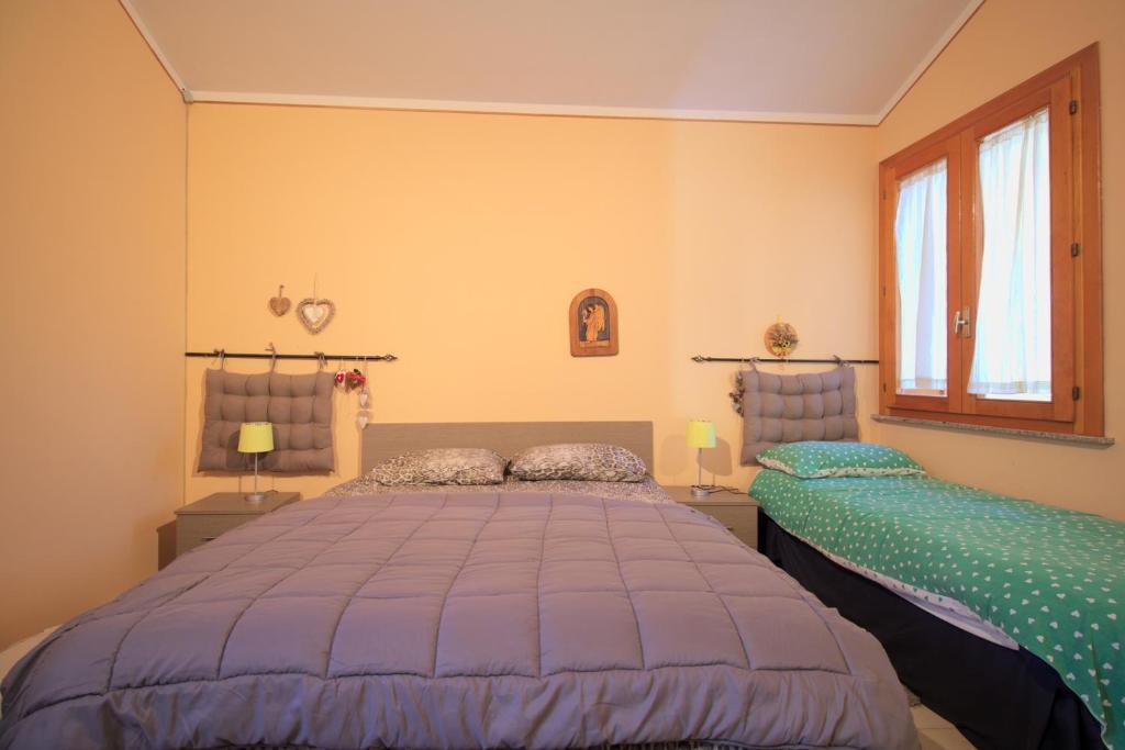 Postel nebo postele na pokoji v ubytování Magma Guest House