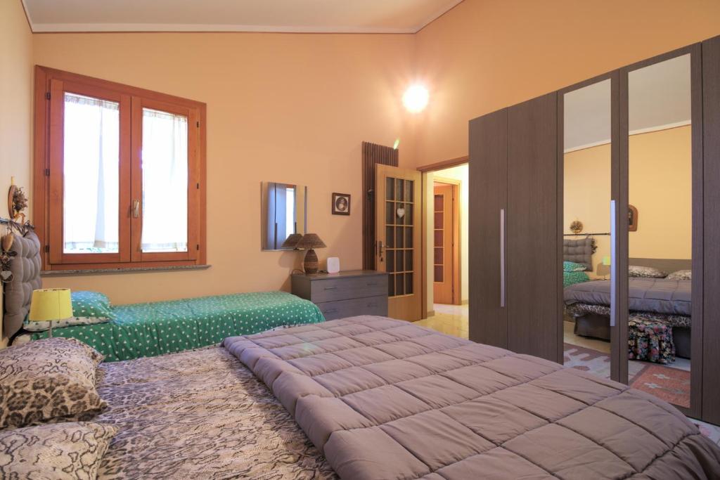 Postel nebo postele na pokoji v ubytování Magma Guest House