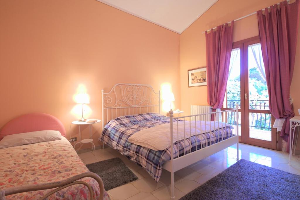 Postel nebo postele na pokoji v ubytování Magma Guest House