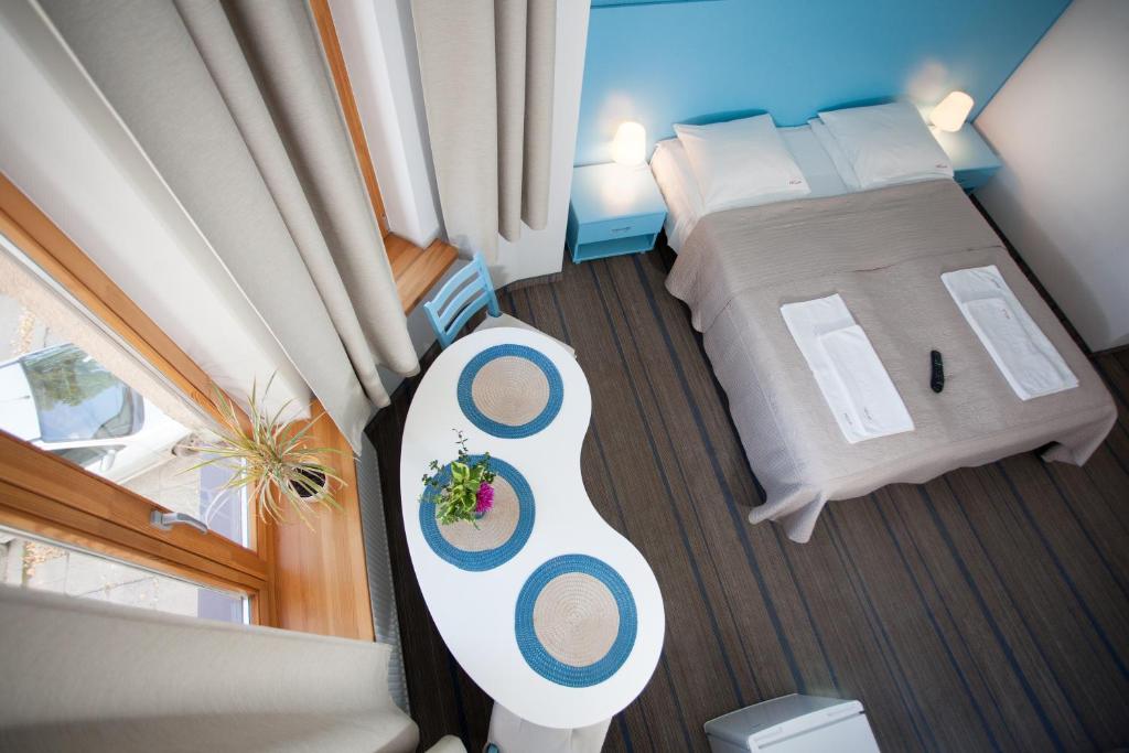 Postel nebo postele na pokoji v ubytování Moja Accommodation