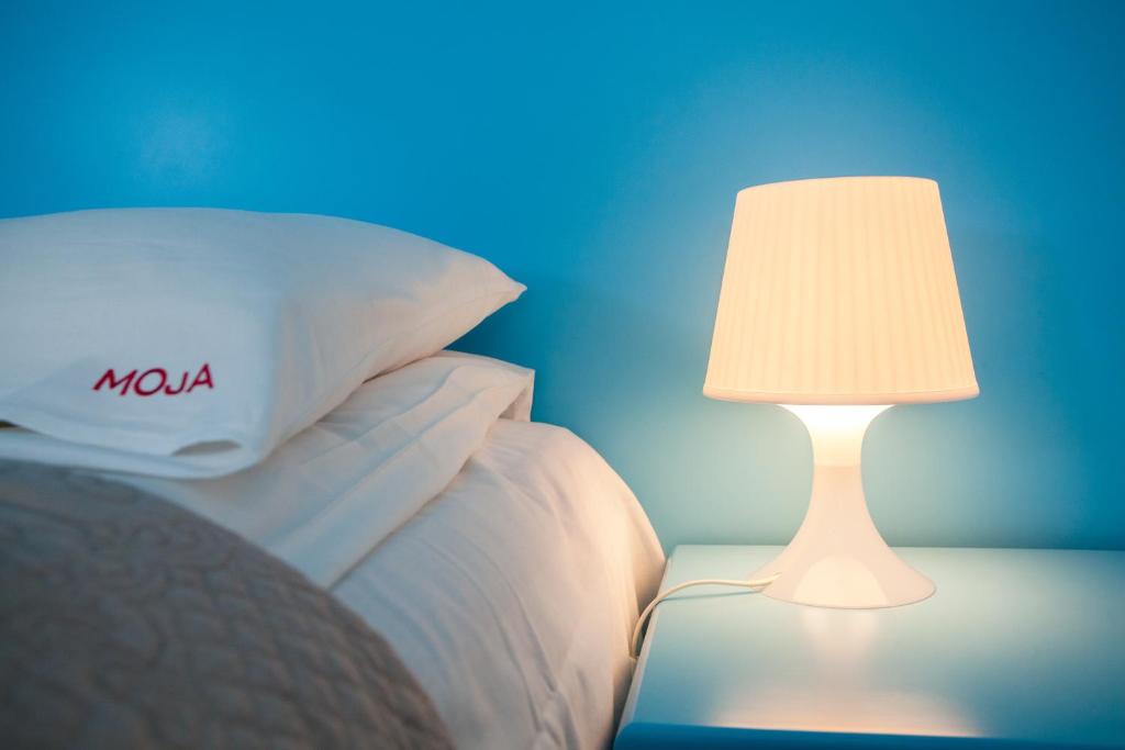 Postel nebo postele na pokoji v ubytování Moja Accommodation