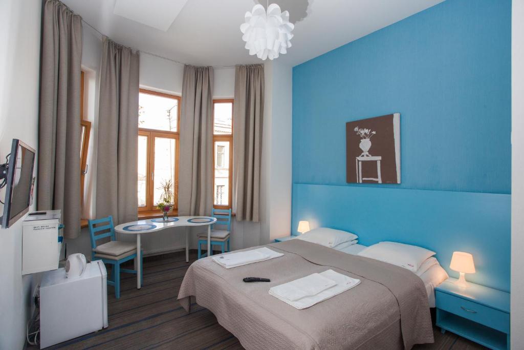 Postel nebo postele na pokoji v ubytování Moja Accommodation
