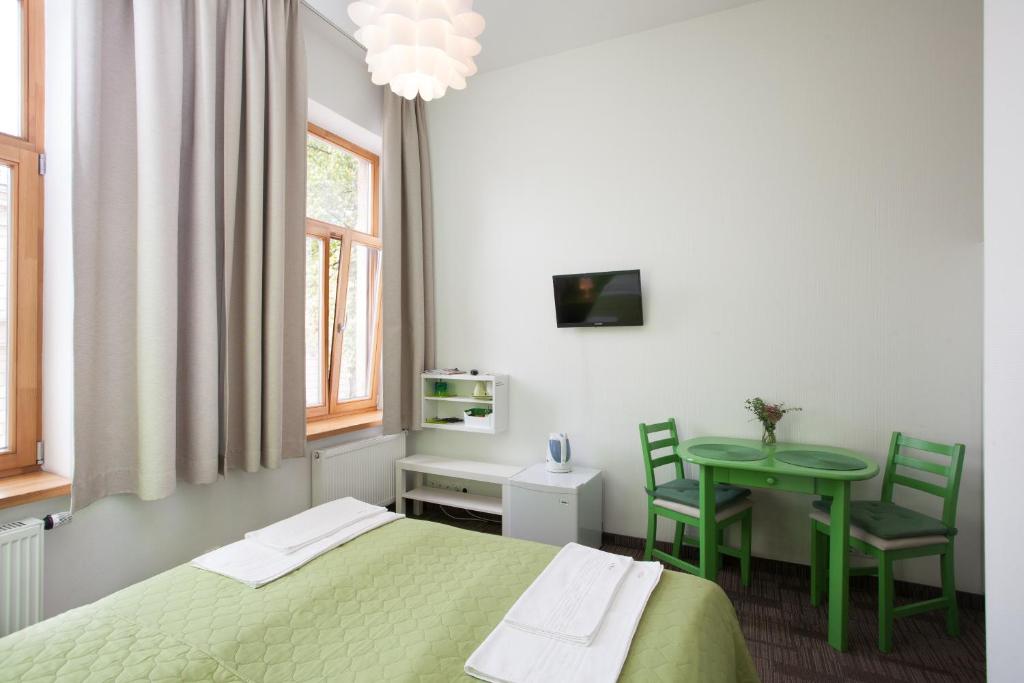 Postel nebo postele na pokoji v ubytování Moja Accommodation