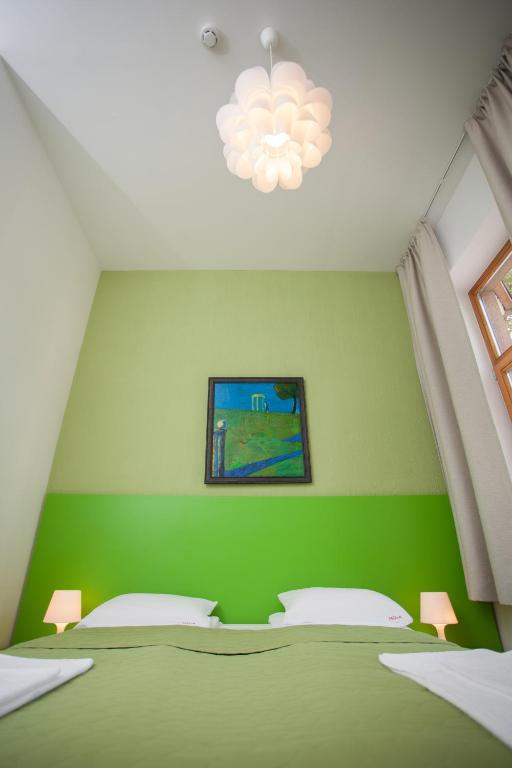 Postel nebo postele na pokoji v ubytování Moja Accommodation