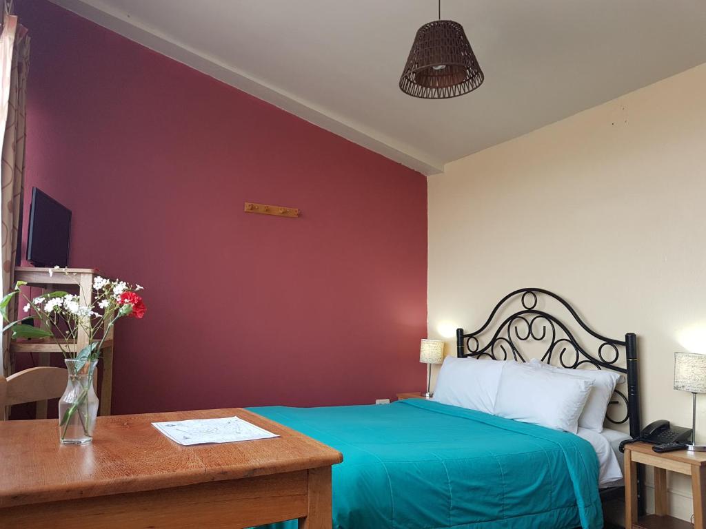 Postel nebo postele na pokoji v ubytování Kurumi Hostel