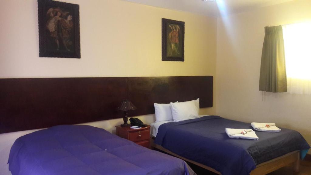Postel nebo postele na pokoji v ubytování Kurumi Hostel