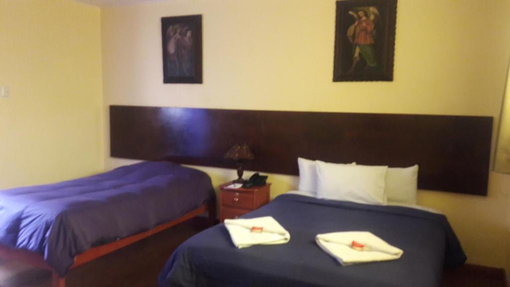 Postel nebo postele na pokoji v ubytování Kurumi Hostel