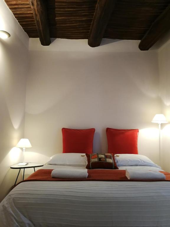 Postel nebo postele na pokoji v ubytování iBed Napoli B&B