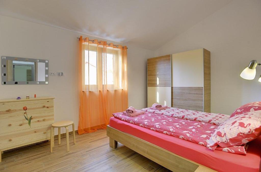 Postel nebo postele na pokoji v ubytování Villa Mareti