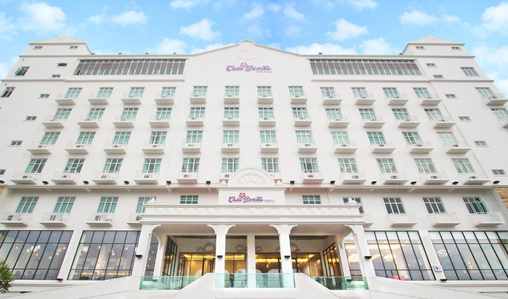 a rendering of the front of a white building at Casa Bonita Hotel in Melaka