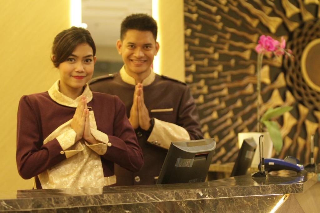 Členové personálu v ubytování Hotel Daily Inn