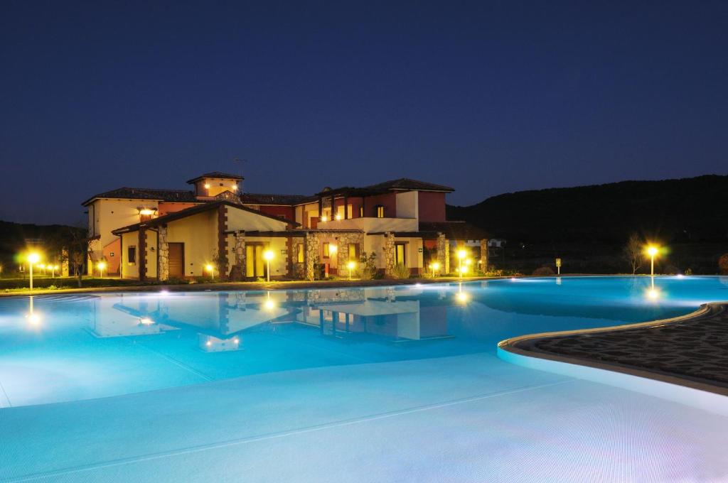 Bazén v ubytování Hotel Sa Cheya Relais & Spa nebo v jeho okolí