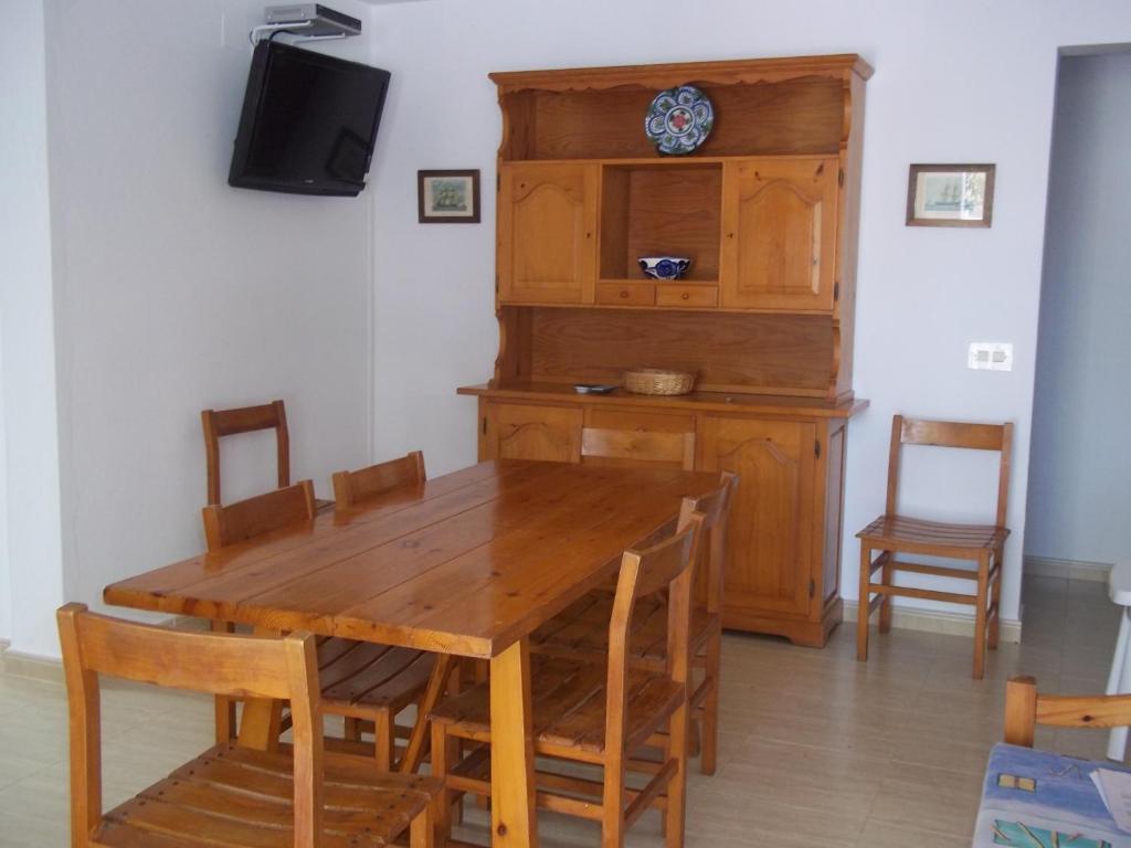 TV a/nebo společenská místnost v ubytování Apartamentos Jardin Playa