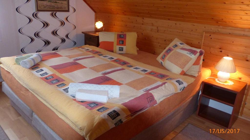 Postel nebo postele na pokoji v ubytování Apartman U Hanicky