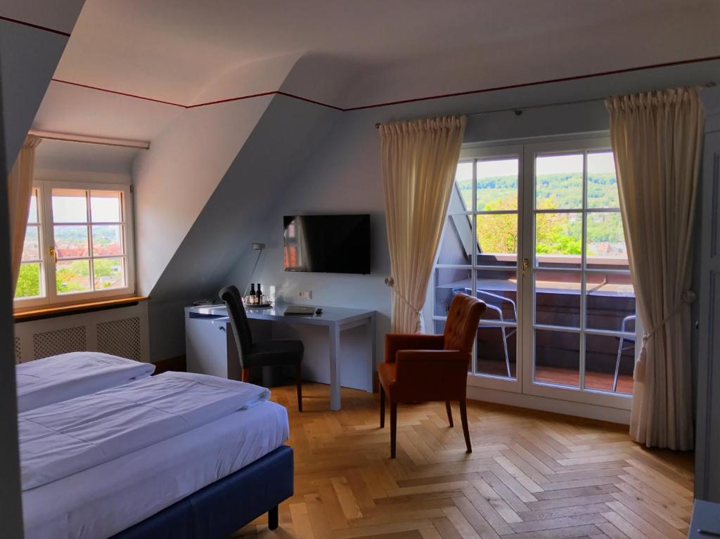 Postel nebo postele na pokoji v ubytování Hotel Villa Elben Lörrach bei Basel