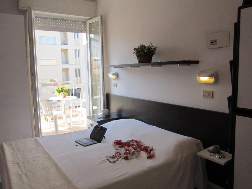 Postel nebo postele na pokoji v ubytování Hotel Des Bains