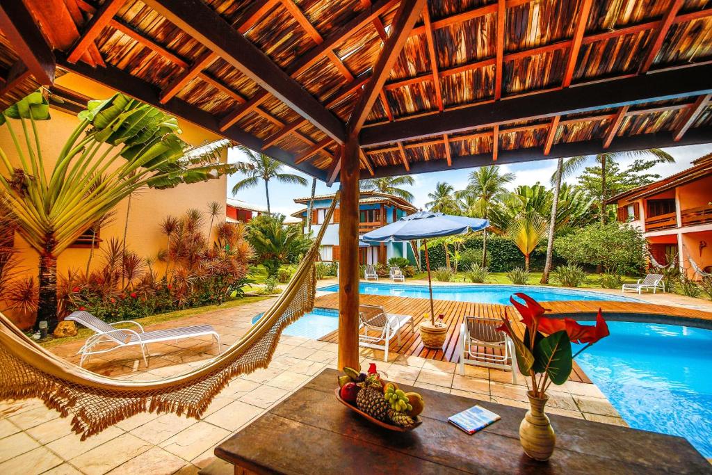 Bazén v ubytování Residence Pé na Areia nebo v jeho okolí