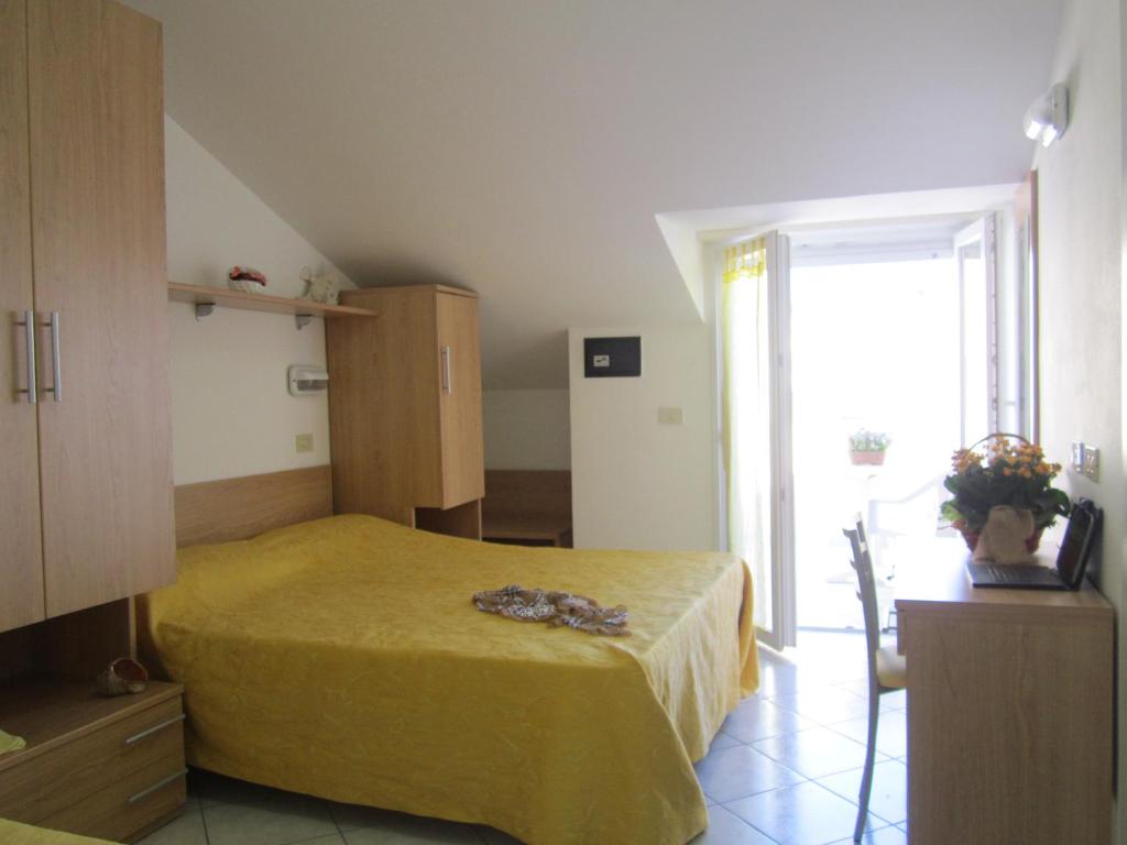 Postel nebo postele na pokoji v ubytování Hotel Des Bains