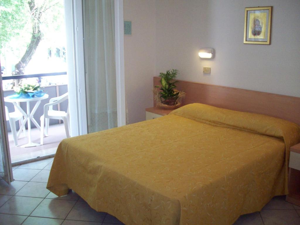 Postel nebo postele na pokoji v ubytování Hotel Des Bains