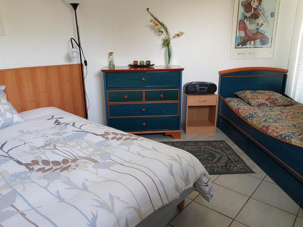 Postel nebo postele na pokoji v ubytování Villa Le Rabailly