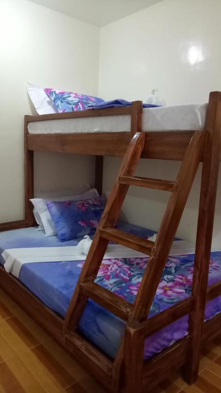 Postel nebo postele na pokoji v ubytování Jvhaven Pension