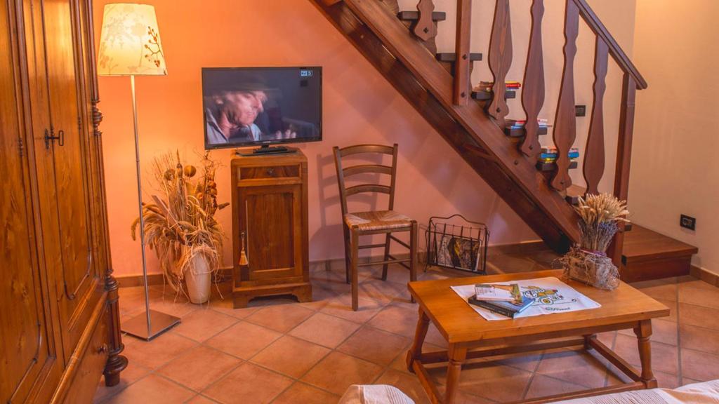 Telewizja i/lub zestaw kina domowego w obiekcie Locanda Camera con Vista
