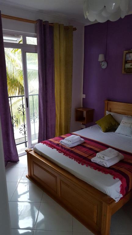 Postel nebo postele na pokoji v ubytování Krishangel Beach Apartment