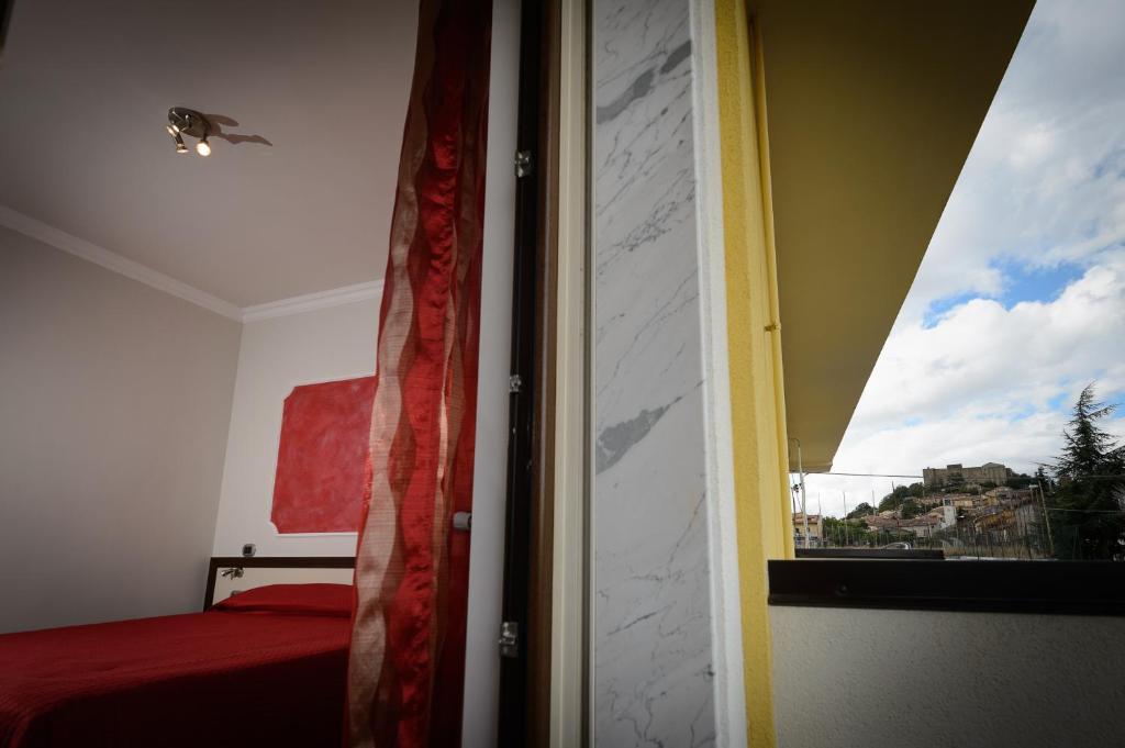 Postel nebo postele na pokoji v ubytování B&B Le Gemme