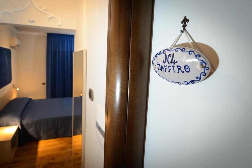 Postel nebo postele na pokoji v ubytování B&B Le Gemme
