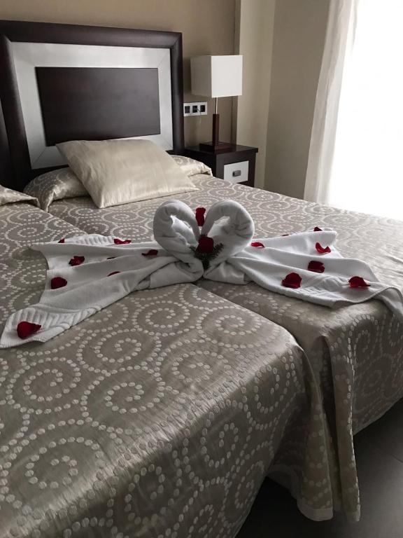 Postel nebo postele na pokoji v ubytování Hotel Rural Real de Poqueira
