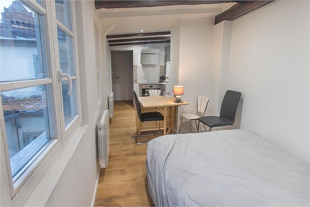 En eller flere senge i et værelse på L'oeil sur la flèche