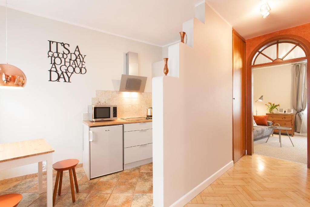 Kuchyňa alebo kuchynka v ubytovaní Mona Lisa Apartments - Kazimierz District