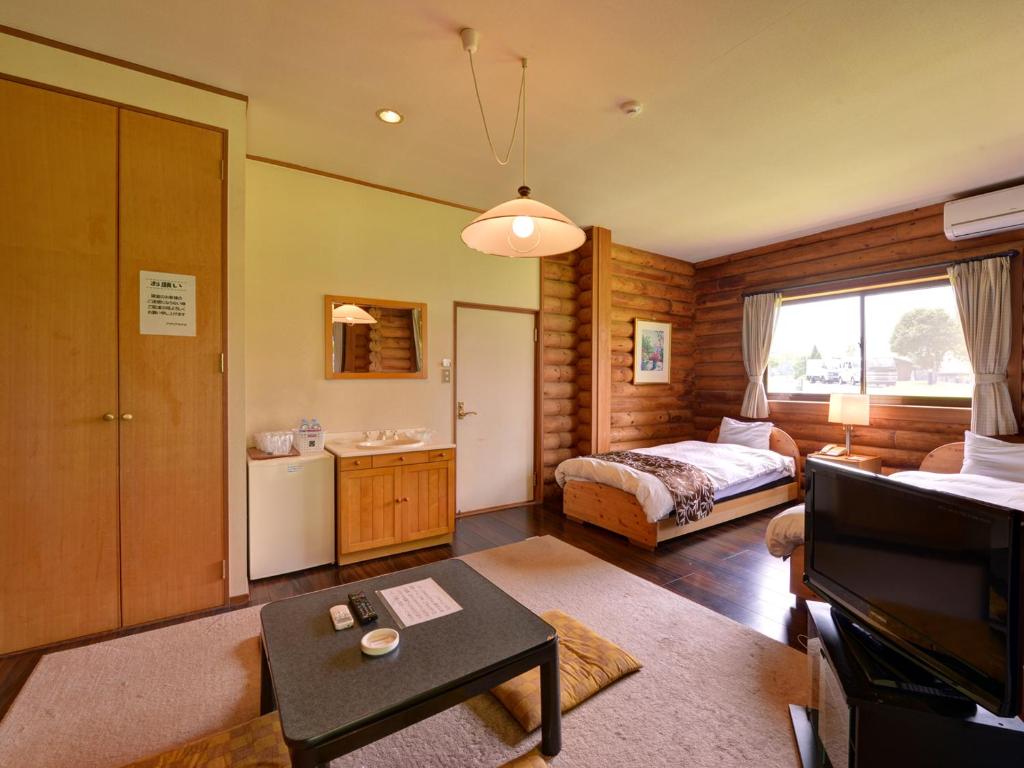 Postel nebo postele na pokoji v ubytování Cocopa Resort Club