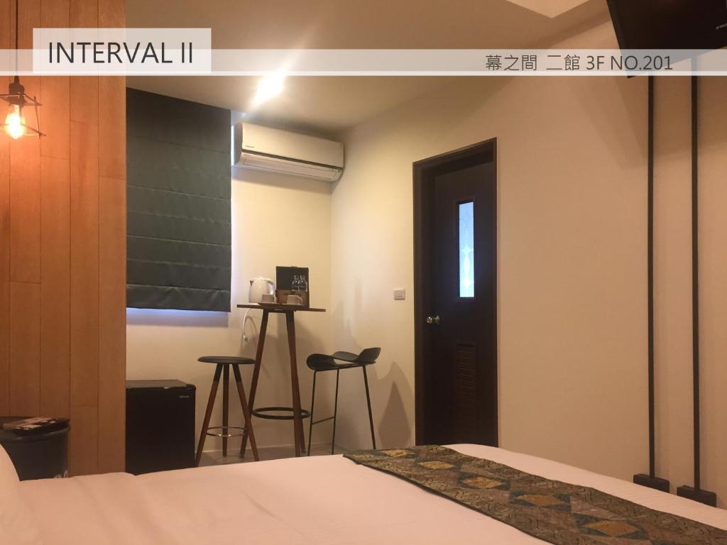 A bed or beds in a room at Interval
