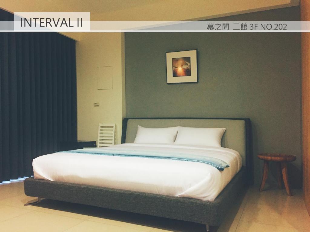 A bed or beds in a room at Interval