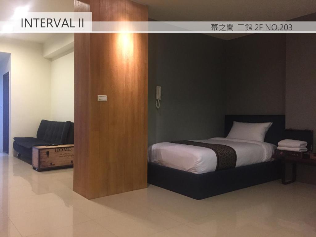 A bed or beds in a room at Interval