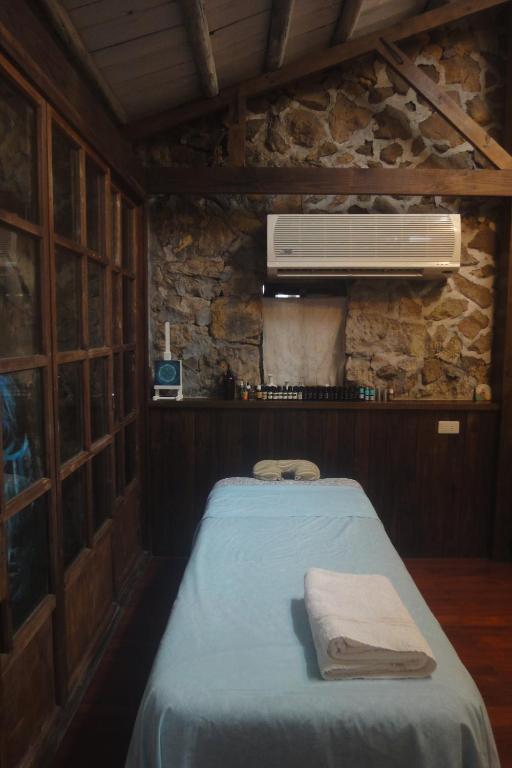 Postel nebo postele na pokoji v ubytování Jiufen Aromatherapy B&B