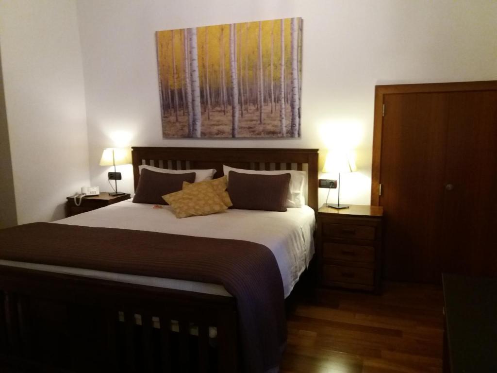 Postel nebo postele na pokoji v ubytování Hotel Segles - Turismo de Interior