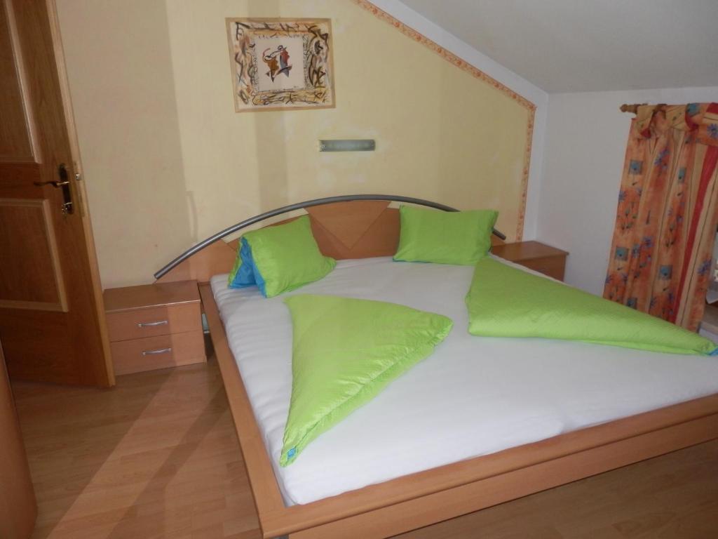 Posteľ alebo postele v izbe v ubytovaní Reiserhof
