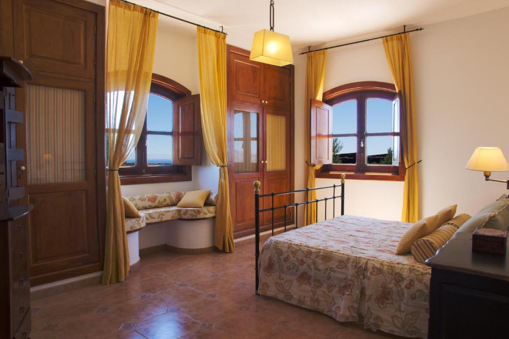 Postel nebo postele na pokoji v ubytování Villas Macher