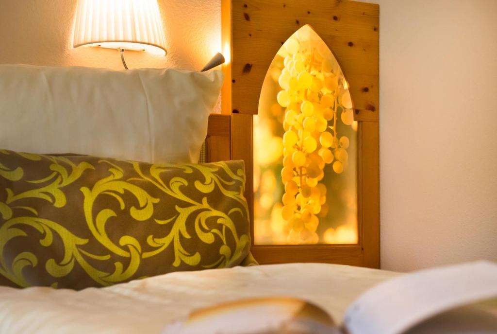 Postel nebo postele na pokoji v ubytování Akzent Waldhotel Rheingau