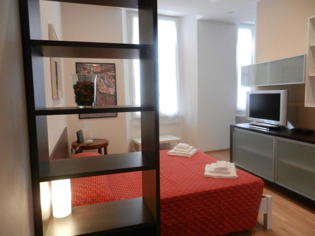 A bed or beds in a room at Central Guesthouse