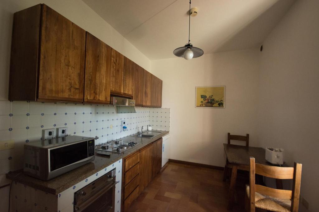 A kitchen or kitchenette at Casa Dei Lecci