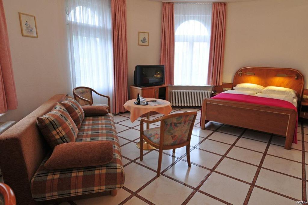 Postel nebo postele na pokoji v ubytování Hotel Haus Reichert