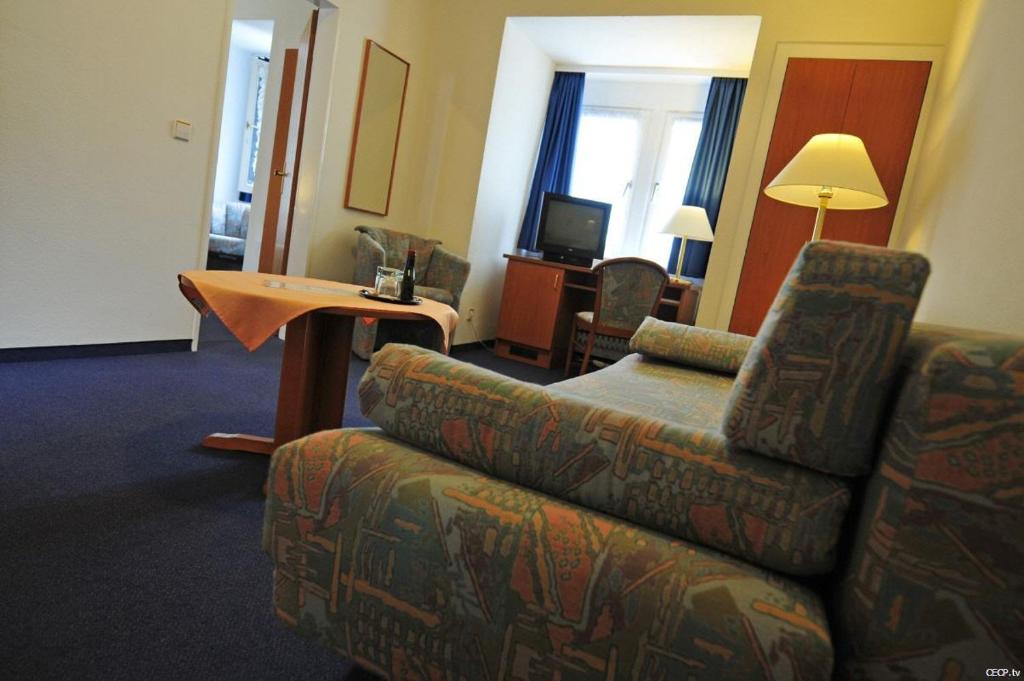 TV a/nebo společenská místnost v ubytování Hotel Haus Reichert