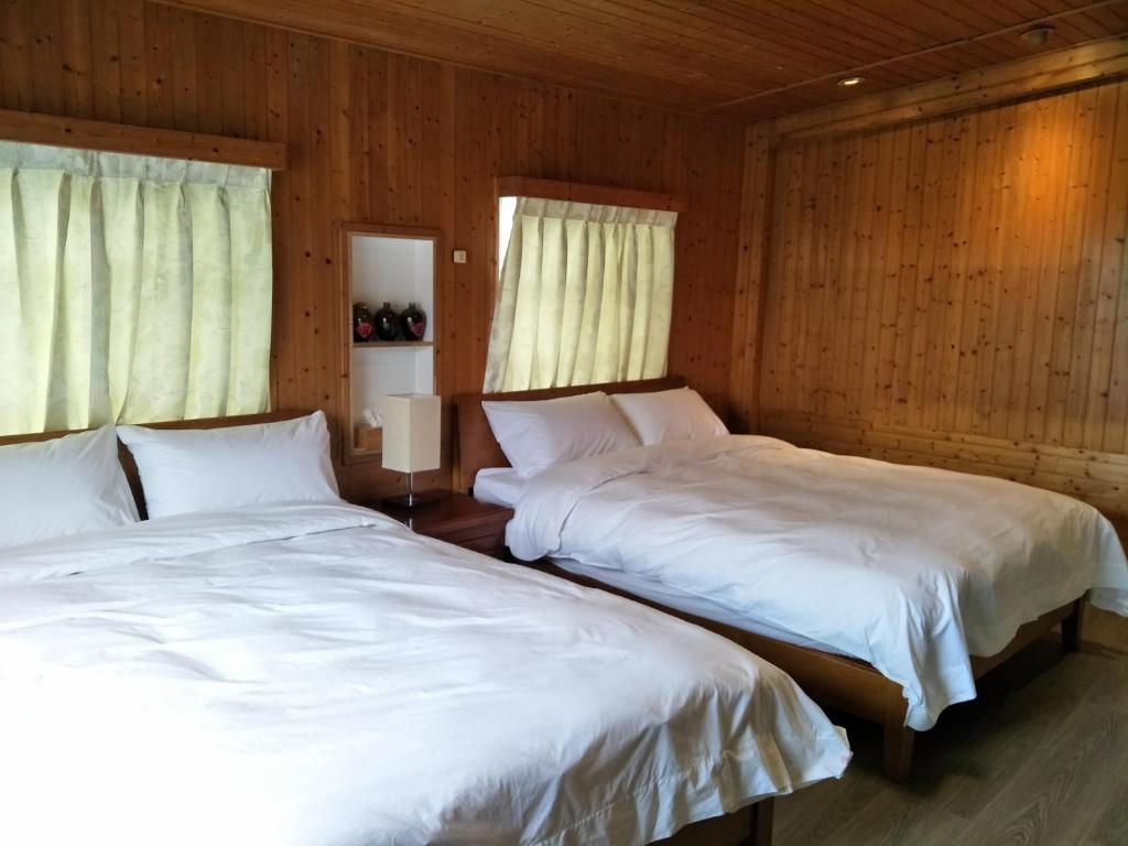 Postel nebo postele na pokoji v ubytování Yes, Sir Homestay
